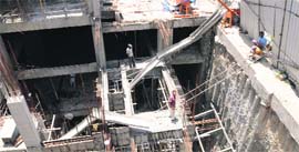 An aerial view of the construction activity going on for a hotel adjacent to the houses in Sant Avenue in Amritsar.