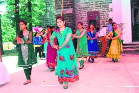 Members of the Sacred Heart community present a dance item on 105th foundation day of Sacred Heart Church in Mussoorie on Sunday