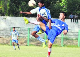 Faceoff: Players in action during the district-level football tournament at Pavilion Ground in Dehradun on Sunday