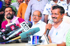 AAP chief Arvind Kejriwal with Prashant Bhushan and Yogendra Yadav at a press conference in Delhi