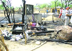 The remains of the gutted jhuggis, at Rampura village in Fazilka on Sunday
