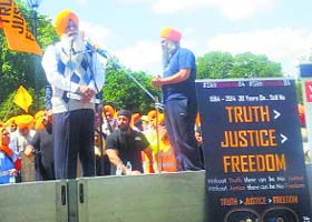 Dal Khalsa head Harcharanjit Singh Dhami addresses a gathering at a function to mark 30th anniversary of Operation Bluestar in the UK