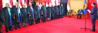Former Army chief Abdel Fattah al-Sissi takes the oath of office as he is sworn in as Egypts President in front of members of the Supreme Constitutional Court in Cairo on Sunday.