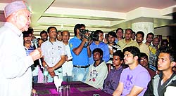 Chief Minister Virbhadra Singh consoles the students who lost their friends to the Beas tragedy in Mandi on Monday