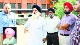 Sukhwinder Singh (inset), who died in police custody last night; and his kin at the Civil Hospital in Jalandhar on Monday.