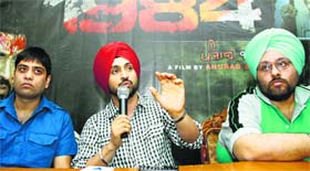 Punjabi actor Diljit Dosanjh addresses mediapersons during the release of the music of the film Punjab 1984 in Jalandhar on Tuesday.