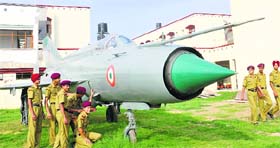 Cadets pose with a aircraft on the AFPI campus in Mohali