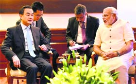 PM Narendra Modi with Chinese Foreign Minister Wang Yi