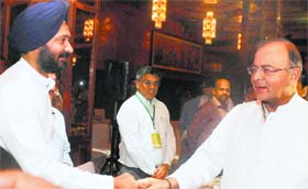 Punjab Finance Minister Parminder Singh Dhindsa with his Union Minister Arun Jaitley in New Delhi on Monday.