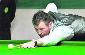 Peter Gilchrist in action during the billiard championship at the UT Guest House in Chandigarh on Tuesday