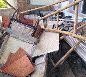 Furniture and waste material lying dumped in the balcony of the UT Secretariat in Chandigarh