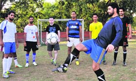 Players busy juggling during a camp at the football stadium in Sector 17, Chandigarh, on Tuesday