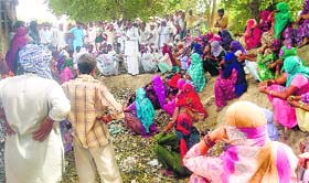 Residents of Lajwana Khurd village protest on the Jind-Rohtak highway.
