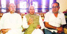 Former Chief Minister Prem Kumar Dhumal addresses mediapersons at Amb in Una on Tuesday.