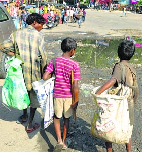Poor children pick rags in Jammu