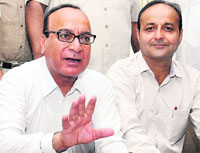 Congress councillors address mediapersons at the MC office in Jalandhar on Tuesday.