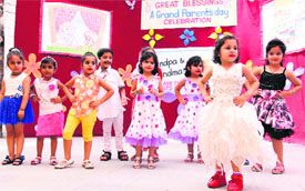 Tiny tots and grandparents (right) dance on a song during a function at CT Public School in Jalandhar.