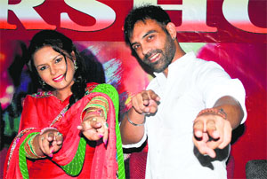 Mannat Singh and Dakssh Ajit Singh, the lead actors of upcoming Punjabi movie Arsho, strike a pose in Ludhiana on Tuesday.