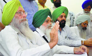 BKU secretary-general Puran Singh Shahkot addresses mediapersons in Ludhiana on Tuesday. 