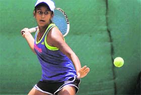 Ishita from Haryana in action during a match at the CLTA, Sector 10, Chandigarh, on Wednesday.