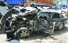 Mangled remains of the car near Britannia Chowk in Northeast Delhi on Wednesday