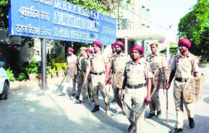 police personnel patrol outside the MC office in Jalandhar on Wednesday.