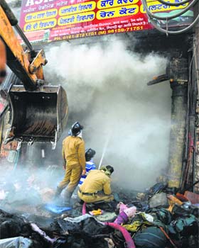 PAU Vice-Chancellor BS Dhillon at the spot where a fire broke out after a duststorm