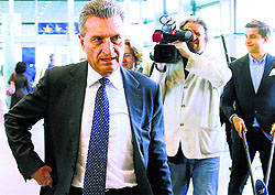 European Energy Commissioner Gunther Oettinger arrives for an EU-Russia-Ukraine trilateral energy meeting in Brussels. 