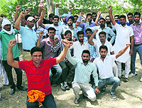 Drivers and EMTs of Dial 108 service assemble at the Civil Hospital before leaving for new stations in Bathinda on Thursday.