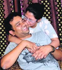 The tricity topper, Dr Vipin Itankar Vithoba, shares his success with his wife, Dr Shalini Ashri, in Chandigarh on Thursday. 