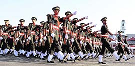 Gentleman Cadets march in files at the Commandants Parade at the Indian Military Academy in Dehradun on Thursday