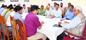 Governor NN Vohra during a meeting with members of the Youth All India kashmiri Samaj at Raj Bhawan in Srinagar on Thursday.
