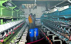 Firemen douse fire at a factory unit in Ludhiana on Thursday