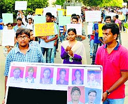 Students take part in a peace march for the 24 engineering students who were swept away in the Beas in Himachal Pradesh, in Hyderabad on Thursday