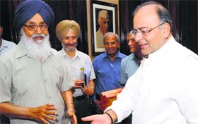 Chief Minister PS Badal with Union Finance Minister Arun Jaitley in New Delhi on Thursday.