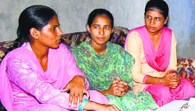 Dalit girls from Matoi village address mediapersons in Sangrur on Thursday.