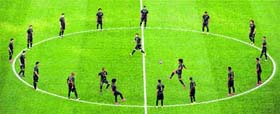 Brazils defender Dante (centre R) kicks the ball during a training session of the Brazilian team at the Corinthians Arena in Sao Paulo on Thursday.