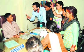 Residents of Jabarkhet in Mussoorie protest at the Jal Sansthan office on Friday against water shortage.