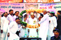 Chief Minister Bhupinder Singh Hooda being felicitated at a function organised to mark the 616th Parkash Utsav of Sant Kabir in Rohtak district on Friday