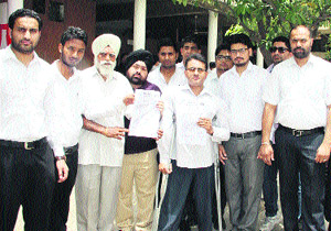 Members of Helpline, an NGO, which opened a front against tantriks and self-styled godmen in Jalandhar on Friday.