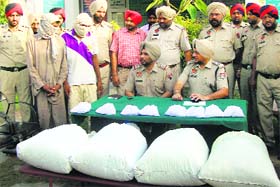 The accused in police custody at Dehlon.