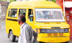 A school bus ferries schoolchildren in Ludhiana.