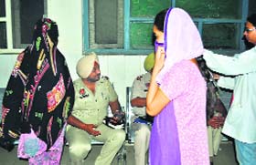 The victim (in pink) at Rajindra Hospital in Patiala on Thursday night