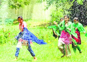 Lighter moments: College girls near a fountain in Patiala on Friday