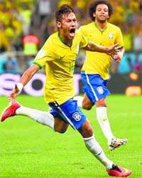 Neymar (L) celebrates after scoring a goal against Crotia at Sao Paulo on Thursday night