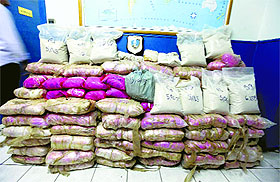 Stacked heroin packages seized in an operation near Athens on Friday. Greek authorities say they have seized a record 1.1 metric tonnes of heroin, worth more than 30 million euros ($40 million).