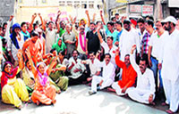Members of various Hindu organisations raise slogans against Shri Durgiana Committee for failing to protect the Bhairav Nath temple in Amritsar on Saturday.