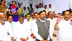 MLA Rajiv Bindal addresses people after ending his three-day fast in Nahan on Saturday