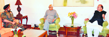 Union Defence Minister Arun Jaitley (right) and Army Chief General Bikram Singh with Governor NN Vohra at Raj Bhawan in Srinagar on Saturday.