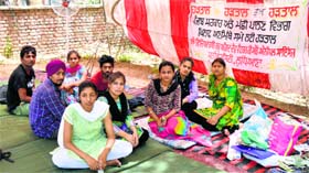 Protesting students outside the Veterinary Hospital in Ludhiana on Saturday.